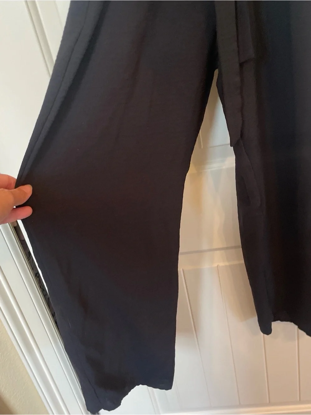 Black Sleeveless Button-Front jumpsuit with Belt